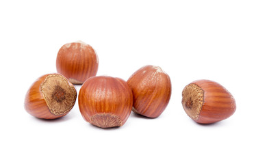 Group healty hazelnuts isolated on white background