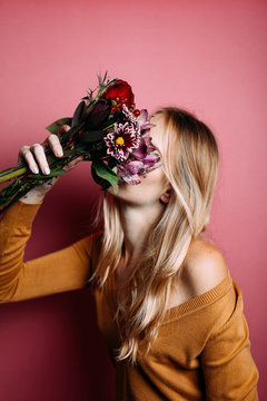 Woman with a bouquet of flowers