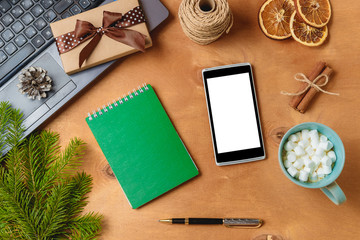 laptop and phone with empty screen for christmas seasonal advertising