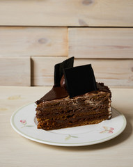 Chocolate cake with fresh strawberry and cup of tea