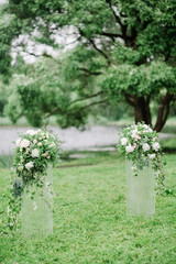 wedding arch with wedding decoration and river view