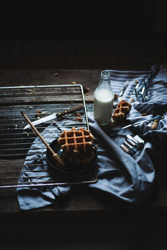 Waffles,honey and milk still life