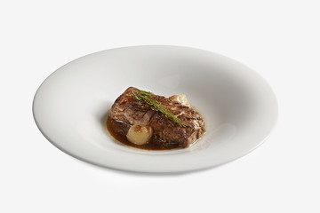 Tuna with sauce of rosemary and little onions