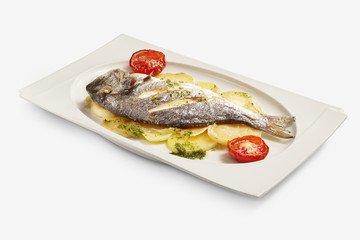 bream fish with roasted potatoes and tomato