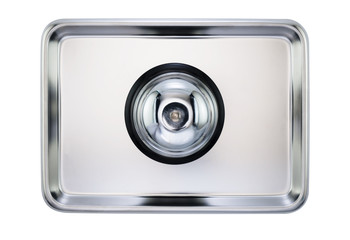 Service bell / Service bell on stainless tray on white background. Top view.