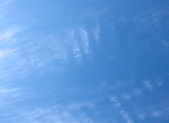 cumulus white clouds against a beautiful blue sky