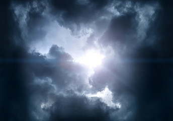 Naklejka na ściany i meble Cloudscape with Ray of Light