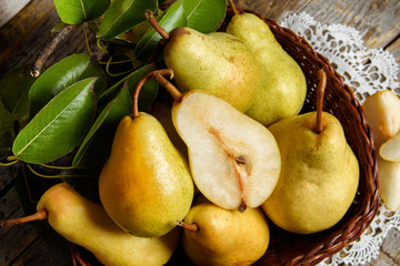 pears on rustic wooden background. autumn harvest 