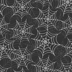 Hand drawn vector spider web seamless pattern on the dark gray background. Halloween design.