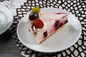 Slice of Delicious cheesecake with fresh berry