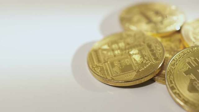 Bitcoins on white background