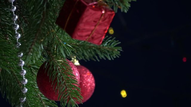 Close up of christmas balls on a fir tree branch with copy space
