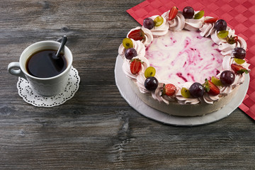 Cheesecake with fresh fruit and berry grapes