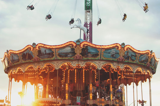 A merry go round at sunset