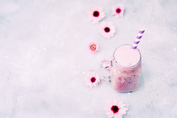 Healthy smoothie in a glass bottle