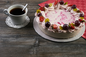 Delicious tart with fresh grapes, strawberries and whipped cream