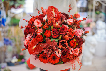 Bright and gorgeous red bouquet of lovely flowers