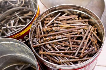 Rusty nails in a old coffee can