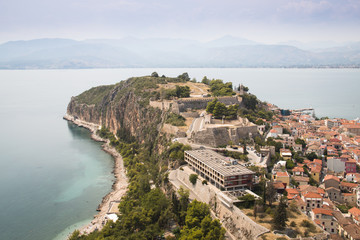 Magnificent view over the old center of Nafplio in Greece taken from Palamidi castle with the sea in the background
