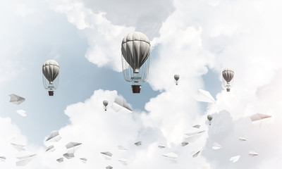 Flying hot air balloons in the air.