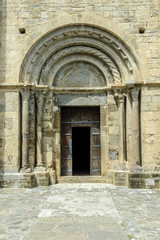 door and Romanesque arches of the church of St Kitts in the Beget town in Gerona, Spain.