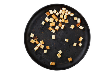 croutons in a frying pan isolated