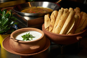 Rolled yummy tortillas with sauce