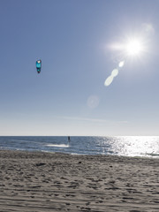 bold kitesurfer ride on water