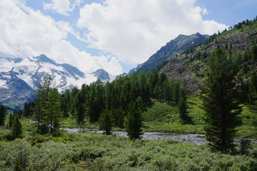 river on the background of mountain peaks