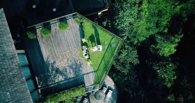 Drone aerial view of wedding ceremony at luxury hotel bali