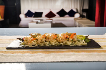 Delicious spaghetti salad with shrimp, tomato and pupunha palm