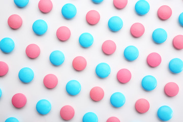 Colorful pills on white background