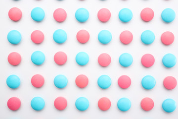 Colorful pills on white background