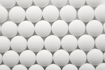 White round pills, closeup