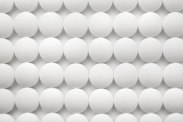 White round pills, closeup