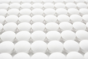 White round pills, closeup