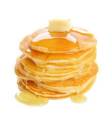 Tasty pancakes with honey and piece of butter on white background