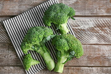 Fresh broccoli on wooden background