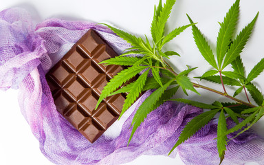 Chocolate block with marijuana leafs