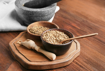 Composition with hemp seeds on wooden background