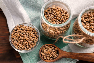 Obraz premium Composition with hemp seeds on table