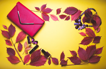 Set of cosmetics and accessories on autumn background