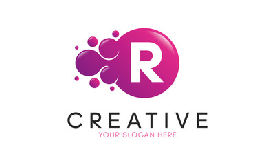 Dots Letter R Logo. R Letter Design Vector with Dots.
