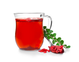 Composition with goji tea on white background