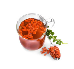 Composition with goji tea on white background