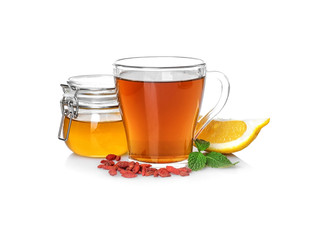 Composition with goji tea on white background
