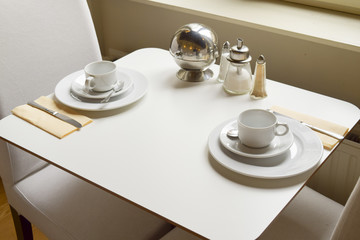 Breakfast table setting and ready to eat