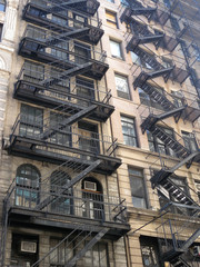 metal fire escape stairs on building facade