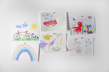 Colorful children's drawings on white background