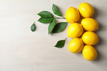 Ripe lemons on light background